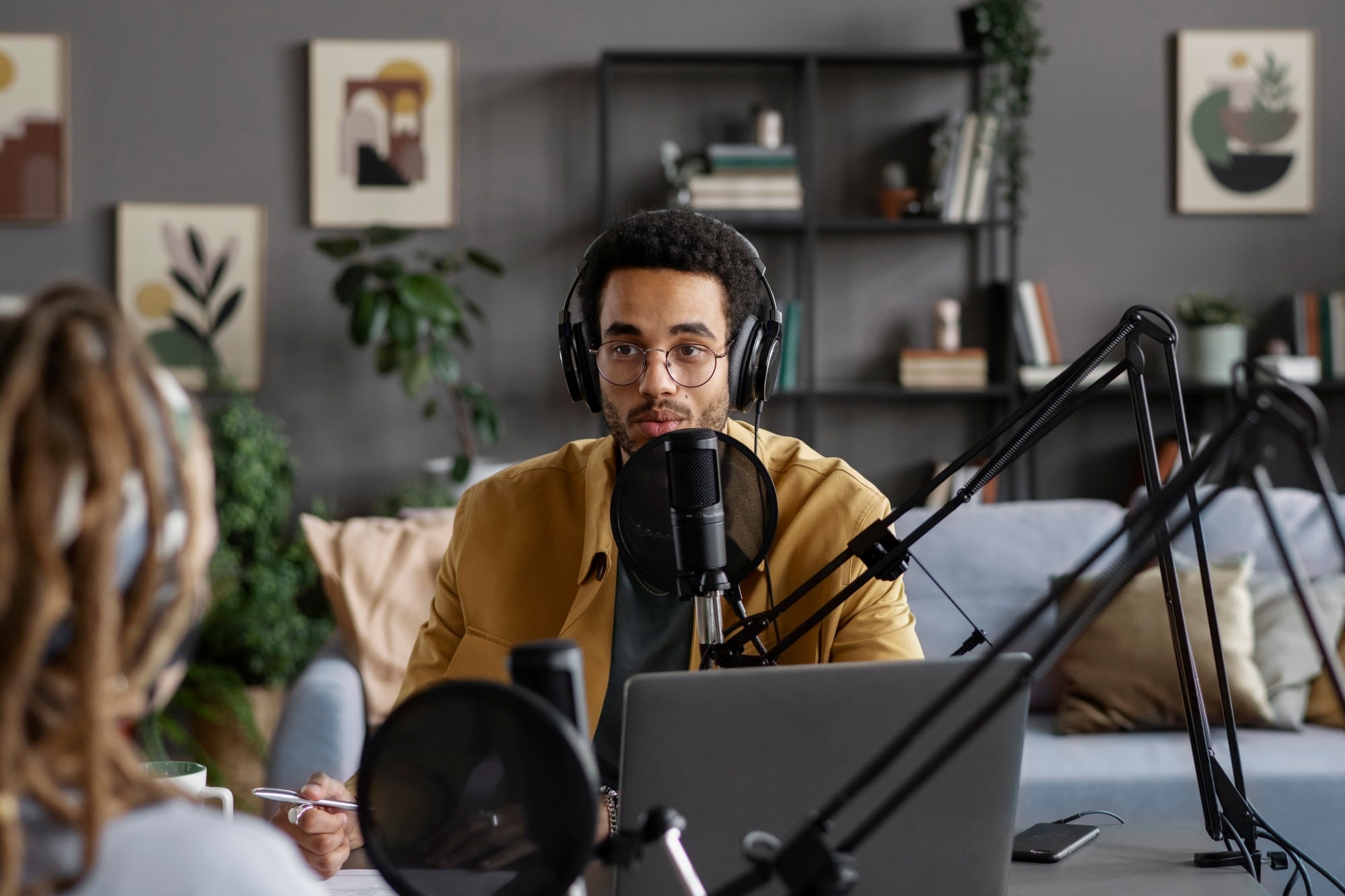 A content creator recording a podcast